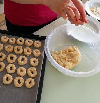 sesame pastries, small bagels with sesame seeds stuck to the dough,