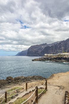 Picturesque sea landscape. Path leading to the ocean (Los Gigantos, Tenerife, Spain)