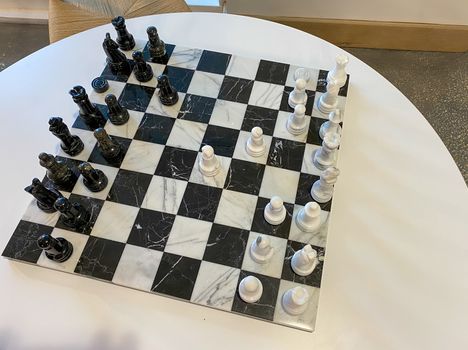 Orlando,FL/USA-10/20/20: A chess board on a table in a recreation room at a luxury apartment building.