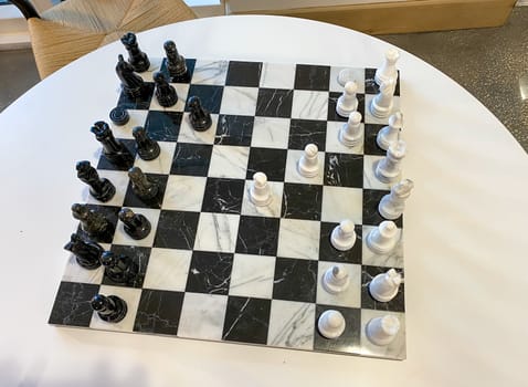 Orlando,FL/USA-10/20/20: A chess board on a table in a recreation room at a luxury apartment building.