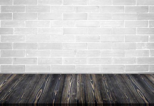 Empty wooden table top with grunge brick white vintage template background, texture brickwall, can be used for display your products.