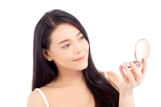 Portrait of beautiful asian woman applying powder puff at cheek makeup of cosmetic, beauty of girl with face smile isolated on white background, wellness and healthcare concept.