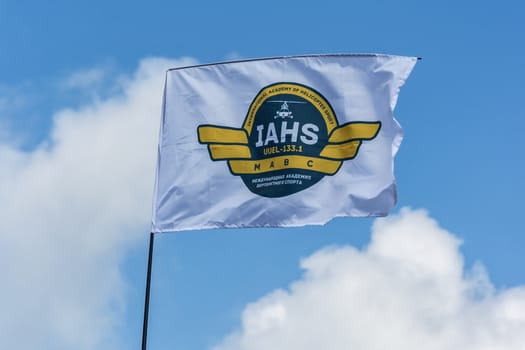 Belarus, Minsk - July 23, 2018: Flag of the International Helicopter Academy at the 16th World Helicopter Championships and 4th World Cup in Helicopter Racing