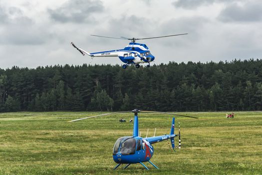 Belarus, Minsk - July 25, 2018: Helicopters of participants of the 16th World Helicopter Championships and 4th World Cup in helicopter racing