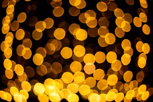 Christmas defocus festive design, defocused garland lights, bokeh effect. New year background.