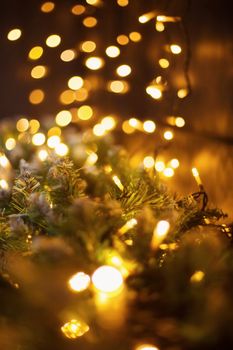 Christmas and New year decoration, defocused garland lights, bokeh effect.