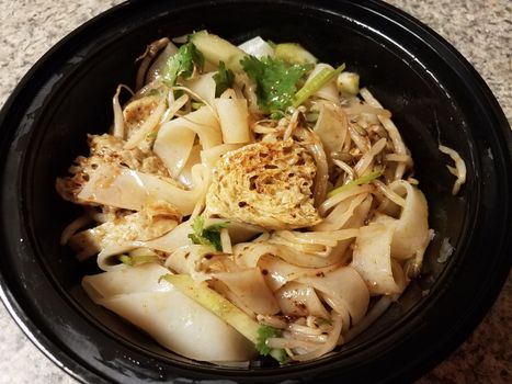 bowl of asian tofu and spicy noodles and vegetables