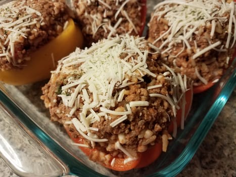 bell peppers with beef and rice and cheese in glass container