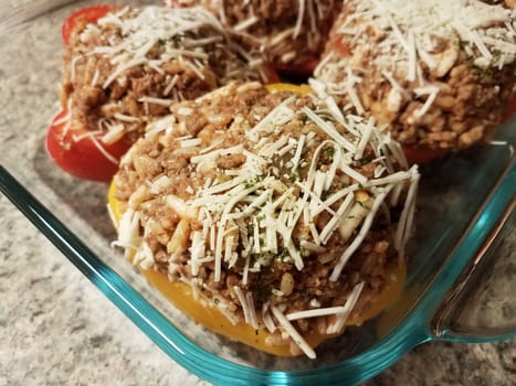 bell peppers with beef and rice and cheese in glass container