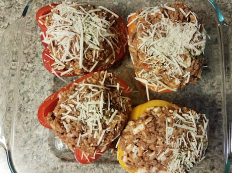 bell peppers with beef and rice and cheese in glass container