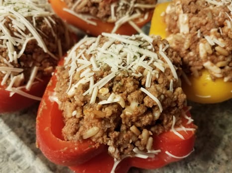 bell peppers with beef and rice and cheese in glass container