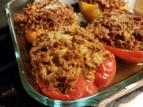 bell peppers with beef and rice and cheese in glass container