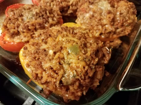 bell peppers with beef and rice and cheese in glass container