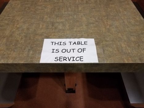 paper this table is out of service sign on table