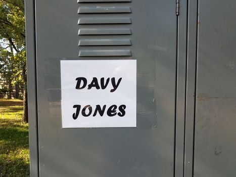 davy jones locker sign on grey metal locker