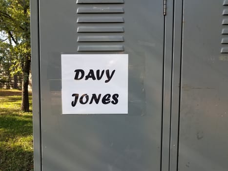 davy jones locker sign on grey metal locker