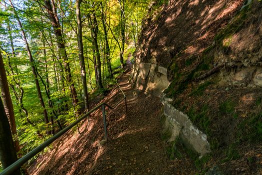 Leisurely hike at the golden hour to the famous Heidenhoehlen near Stockach on Lake Constance