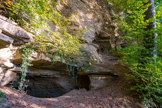 Leisurely hike at the golden hour to the famous Heidenhoehlen near Stockach on Lake Constance