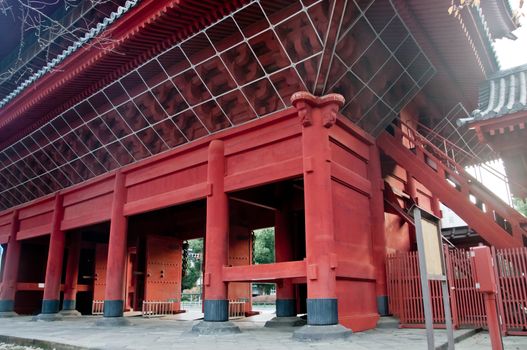 TOKYO, JAPAN - DECEMBER 1, 2018: Zojo-ji Buddhist temple. This is a famous temple which has the oldest wooden main gate in Tokyo built from 1622. There is nobody in the photo.