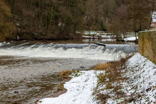 Water dam, barrage in the Glan river in Meisenheim, Germany