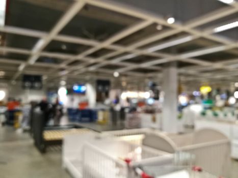 Defocused blurry scene of self pick and pack furniture warehouse shop