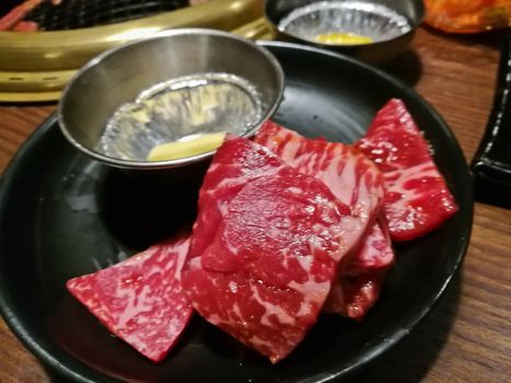 Premium Japanese Wagyu marbling grilled beef yakiniku fire pot in Tokyo Japan