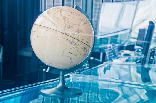 Vintage old classical retro Earth Globe model in a business strategy operation board executive management room