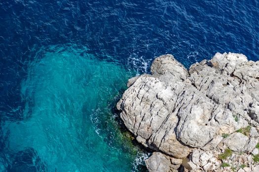 Bay on the peninsula La Victoria, Mallorca with rock in the water and rocky coastline