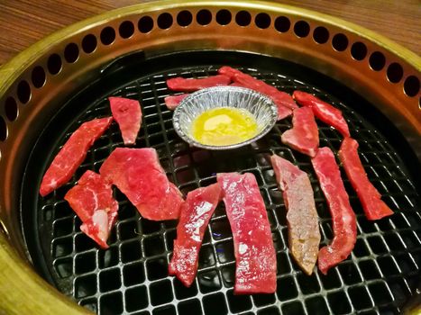 Premium Japanese Wagyu marbling grilled beef yakiniku fire pot in Tokyo Japan