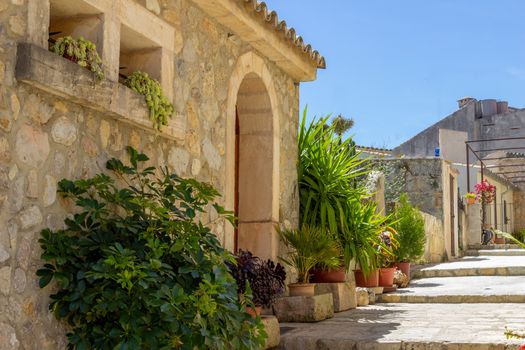 Small road and house in the village Campanet in the north of Mallorca