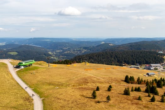 Scenic view from Feldberg tower at landscape of Black Forest, Germany in autumn with multi colored trees