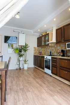 Kitchen set in a standard apartment in a classic style