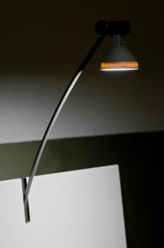 Modern drawing light lamp on top of white drawing board