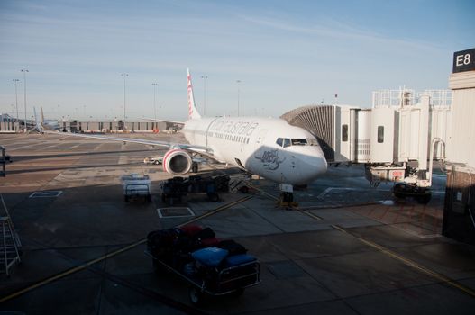 MELBOURNE, AUSTRALIA - JULY 26, 2018: Boeing 737 Virgin Australia plane parks at Melbourne airport