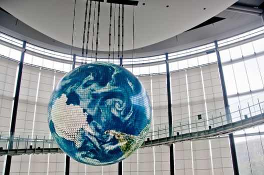 TOKYO, JAPAN - DECEMBER 2, 2018: Miraikan National Museum of Emerging Science and Innovation. The Geo-Cosmos floating earthsphere displays rendition of earth surface by 10 million pixels of organic LED panels. There is nobody in the photo.
