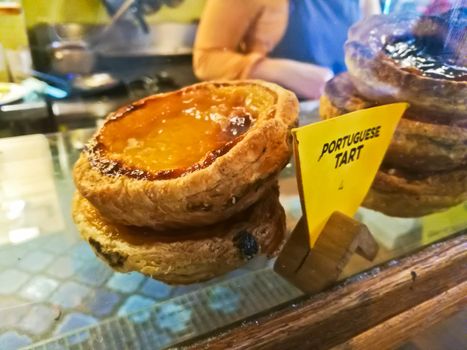 Sweet crispy stack of Portuguese egg tart