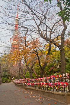 TOKYO, JAPAN - DECEMBER 1, 2018: Scene of wind turbine papers to worship souls of children in the back park of Zojo-ji Buddhist famous temple built from 1622. There is nobody in the photo.