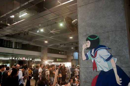 HONG KONG, HONG KONG SAR - NOVEMBER 17, 2018: Queen’s College and Police Married Quarters (PMQ) with scene of people gathers to go shopping for art products in flea market event.