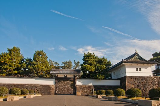 TOKYO, JAPAN - DECEMBER 1, 2018: Japanese royal Imperial Palace side gate in sunny morning. There is no body in the photo.