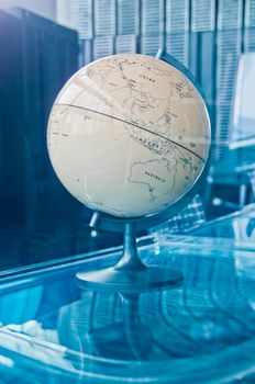 Vintage old classical retro Earth Globe model in a business strategy operation board executive management room