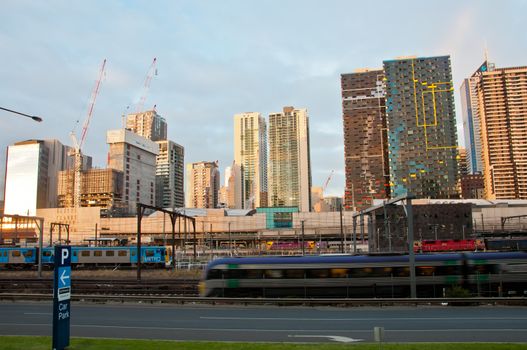 MELBOURNE, AUSTRALIA - JULY 26, 2018: Southern Cross train station and Melbourne Australia skyscrapers background