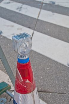 Solar cell device to power flashlight on top of traffic management