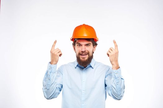 emotional men orange helmet engineer construction industry lifestyle cropped view. High quality photo