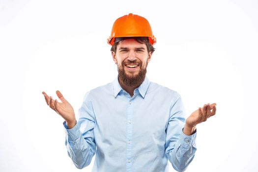 Man in working uniform orange hard hat lifestyle official. High quality photo