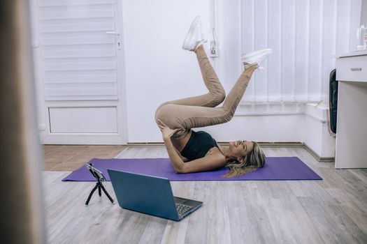 Fitness Yoga coaching working from home - Personal training online stock photo