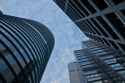 Look up on high sky and modern corporate office buildings