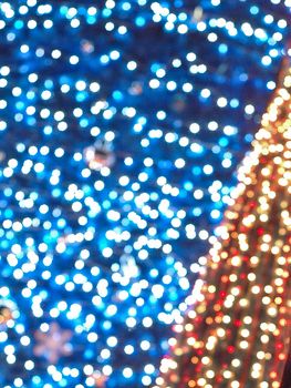 Defocused blue red Christmas New Year celebration festive light backgroud