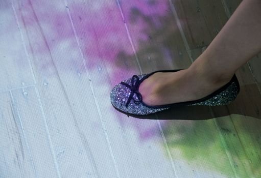 Beautiful blister glister lady shoe on colourful floor