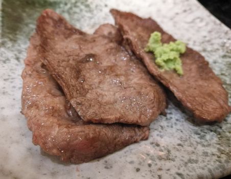 Grilled Tokyo premium beef served with fresh Wasabi powder