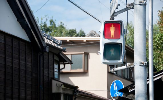 Red man STOP traffic sign in a city